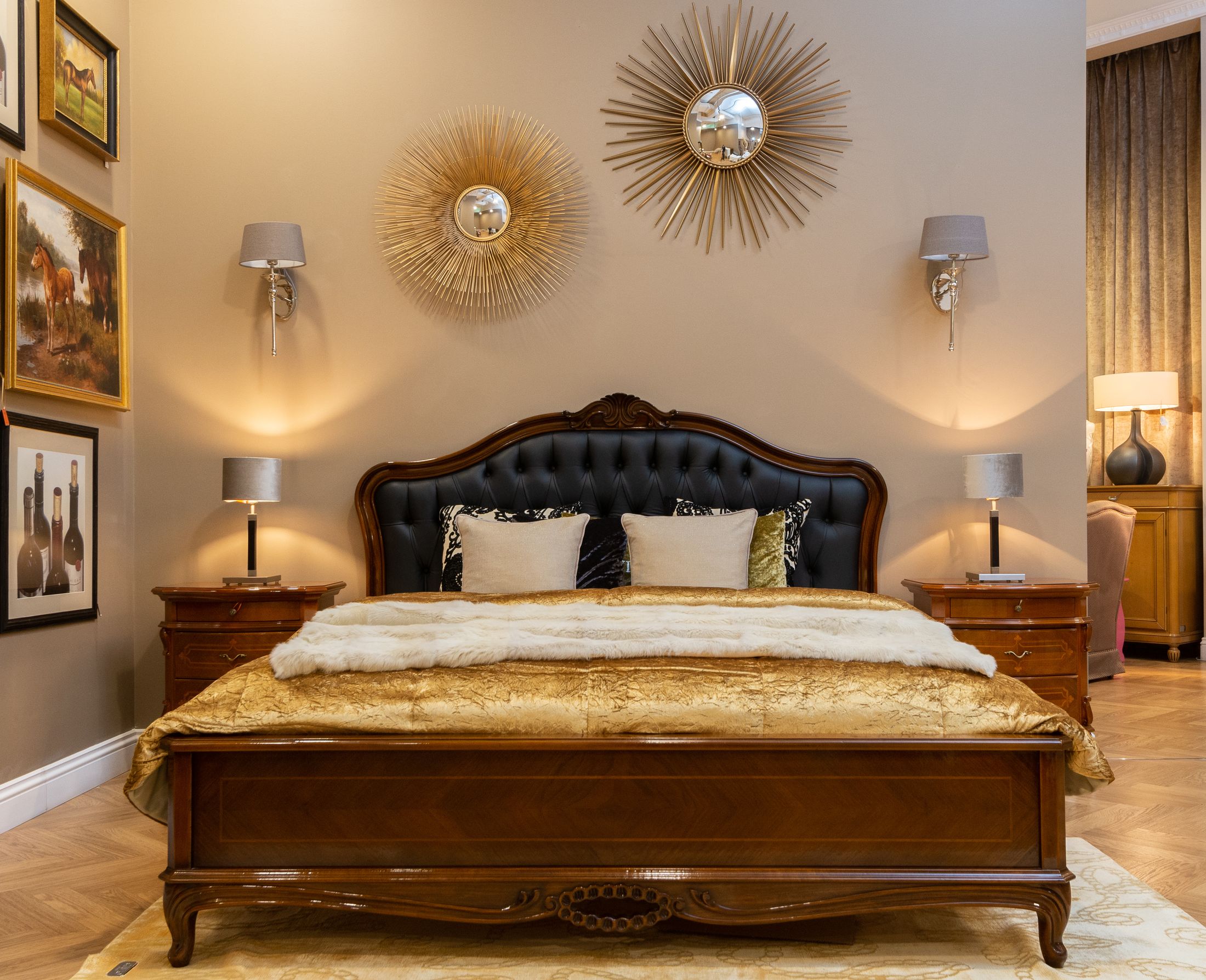 Illustrative luxury bedroom with warm lighting and layered bedding